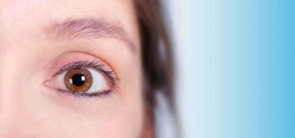 Young female without glasses after LASIK eye surgery